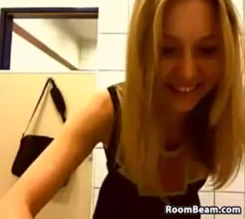 Blonde Teasing In A Public Washroom